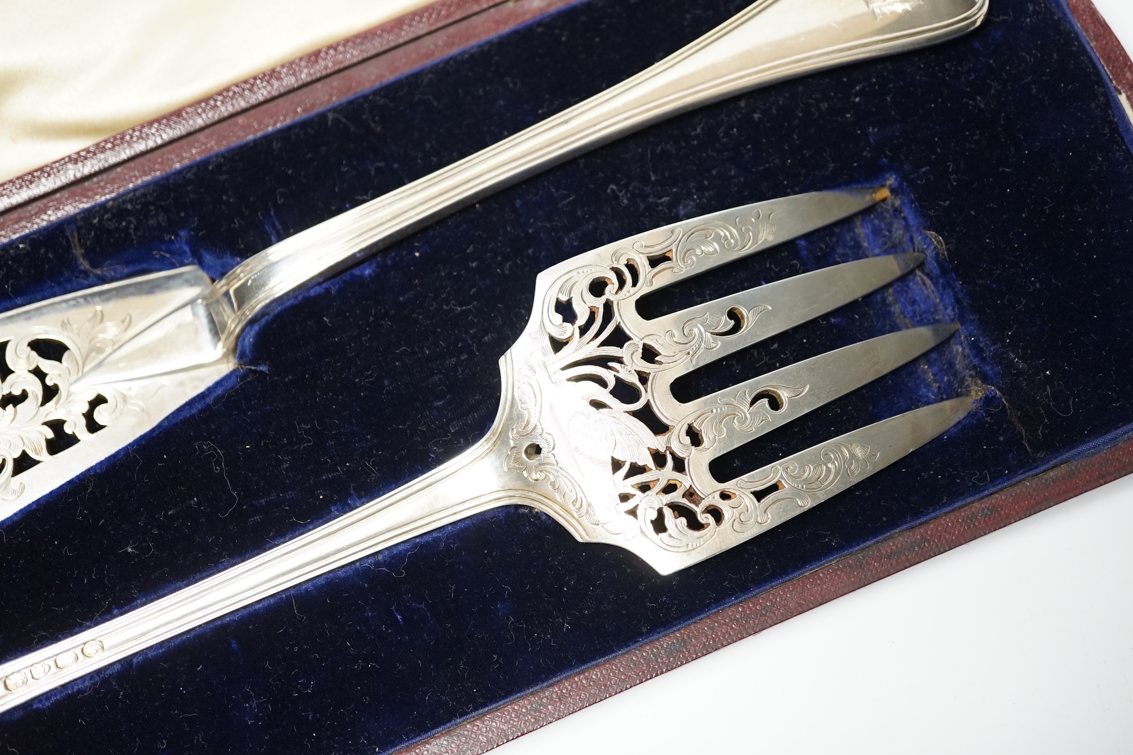 A cased pair of Victorian silver Old English thread pattern fish servers, by George Adams, London, 1850, 9.8oz.